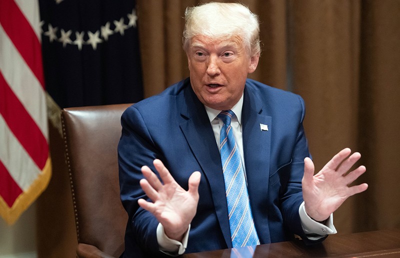 US President Donald Trump speaks during a roundtable meeting.