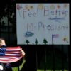 handwritten 'Feel Better Mr. President' sign