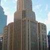 The CenturyLink Building in Minneapolis with a microwave antenna on the top. It looks like a black spiky crown on the top of the building.