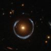 Another Einstein Ring. This one is named LRG 3-757. This one was discovered by the Sloan Digital Sky Survey, but this image was captured by Hubble's Wide Field Camera 3. Image: NASA/Hubble/ESA