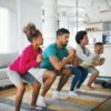 parents and kids working out at home together