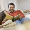 daughter and father reading a picture book