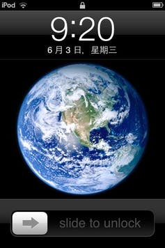 Screenshot of an iPod showing an image of the earth and the slide-to-unlock bar