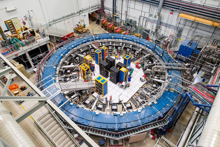 A large blue doughnut–shaped magnet used to measure muons.
