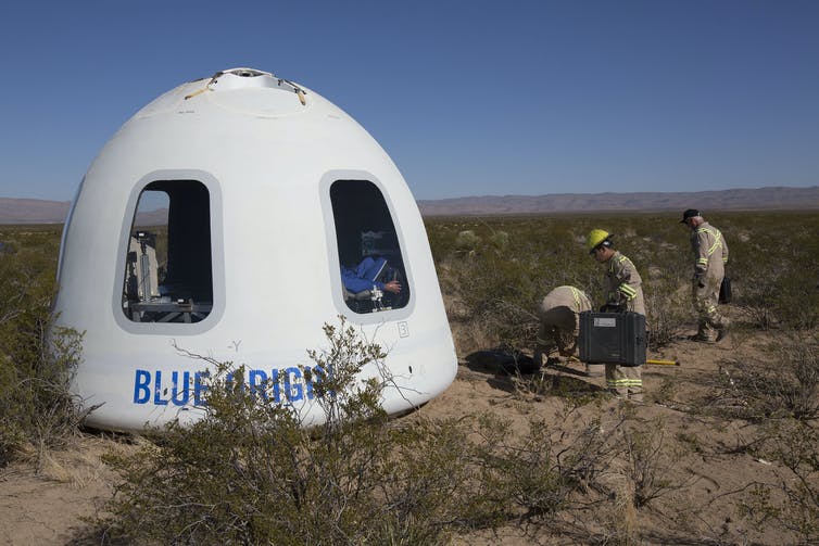 A white domed capsule with windows in the Texas desert.