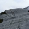 Glaciologists measure, model hard glacier beds, write slip law to estimate glacier speeds