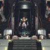 Samus steps out of a chamber in a screenshot from Metroid Dread.