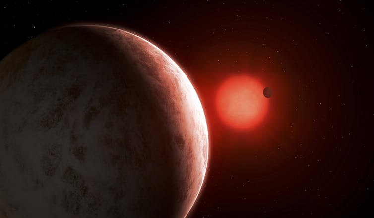 An exoplanet orbiting a red dwarf star.