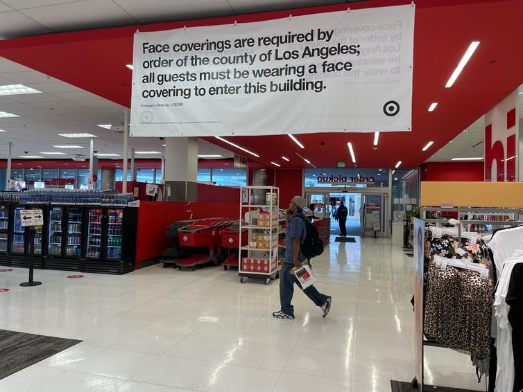 Sign inside Target stating masks must be worn
