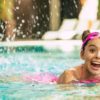 Smiling child in swimming pool