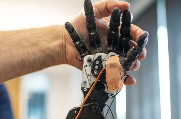 This robot uses tactile sign language to help deaf-blind people communicate independently
