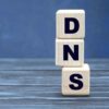 concept word DNS on cubes on a beautiful gray blue background