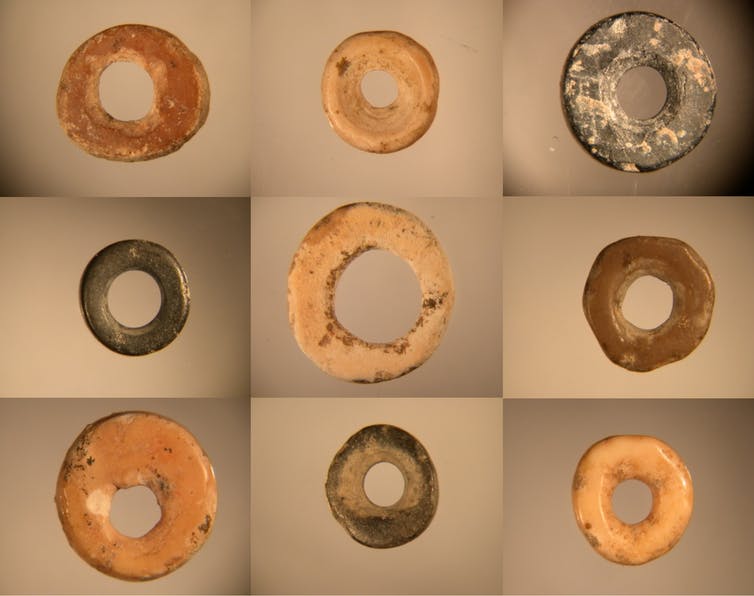 Nine disc-shaped beads