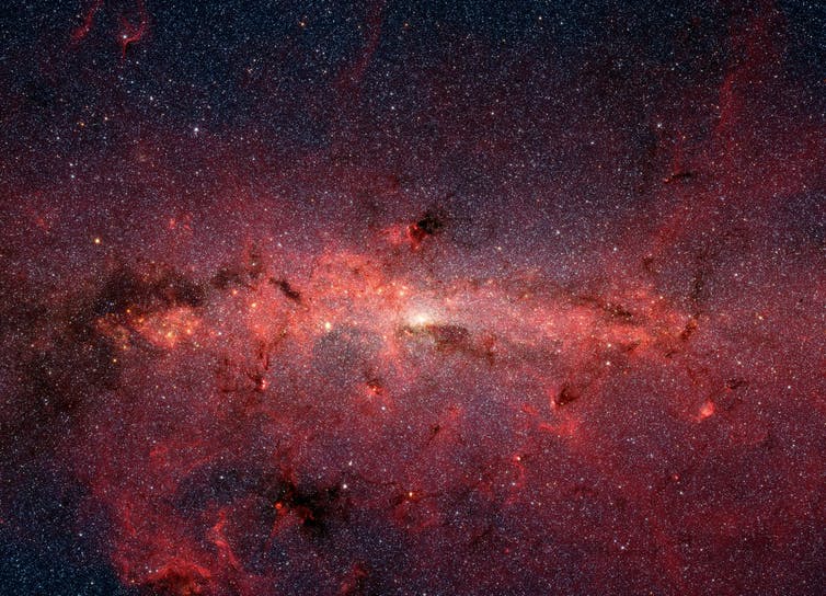 A red mass of gas and stars at the center of the Milky Way.