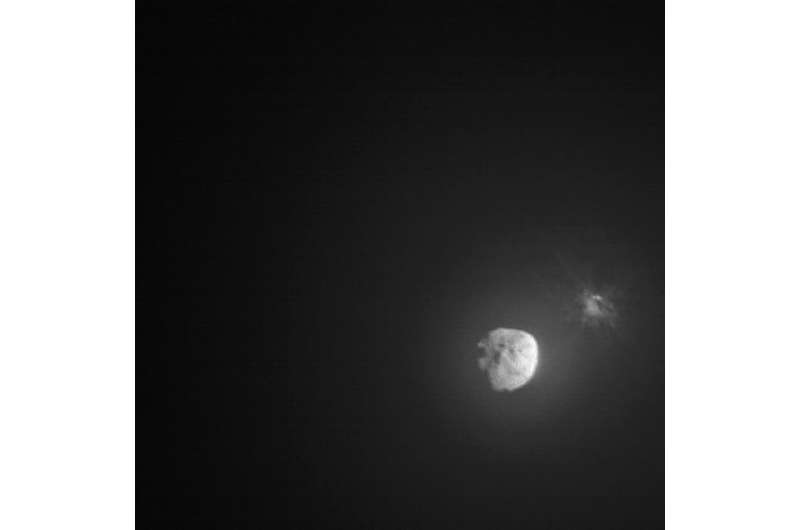 This handout picture obtained by the Italian Space Agency’s LICIACube shows the intentional collision of NASA's Double Asteroid 