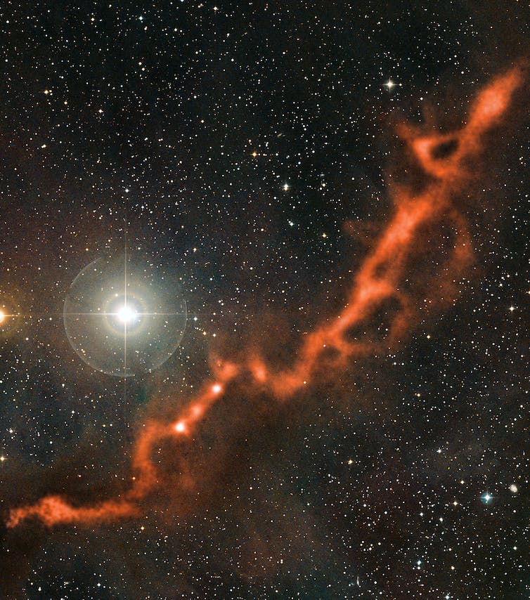 A cloudy filament against a backdrop of stars.