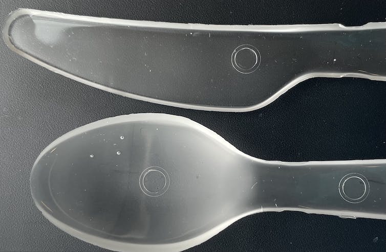 A clear spoon and knife.