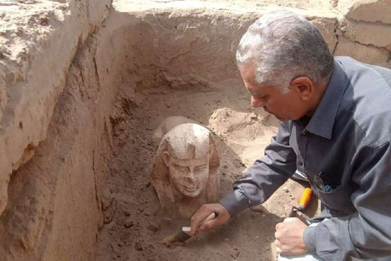 The sphinx statue is unearthed