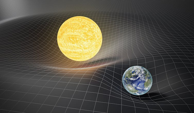 A diagram showing the Sun and Earth warping space.