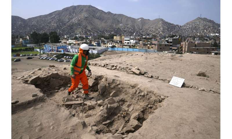 Archaeologists find mummy surrounded by coca leaves on hilltop in Peru's capital