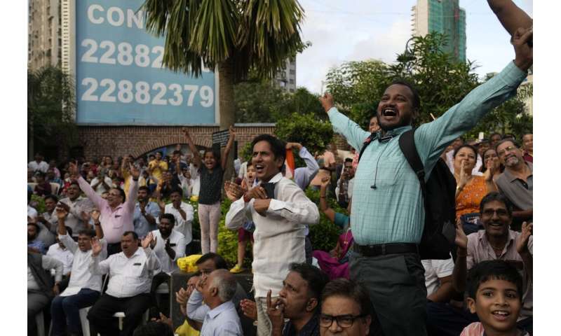 India lands near the moon's south pole, a first for the world as it joins elite lunar club