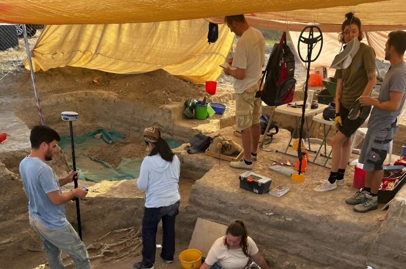 A handout picture shows an archaeological expedition team from the University of Gothenburg working at a site in Cyprus, on the 