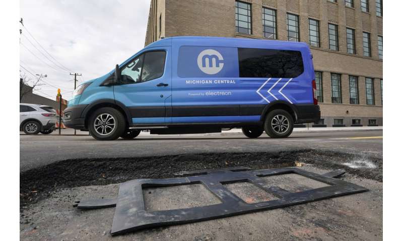 New technology installed beneath Detroit street can charge electric vehicles as they drive