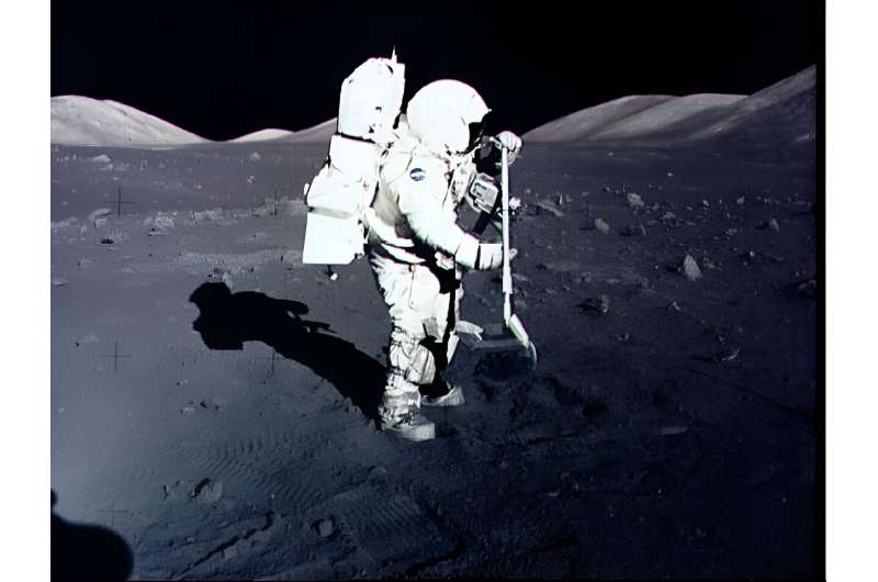 Astronaut Harrison Schmitt collects lunar rake samples at the Taurus-Littrow landing site on the moon during the Apollo 17 mission, America's last lunar landing