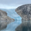 Microscopic defects in ice influence how massive glaciers flow ...