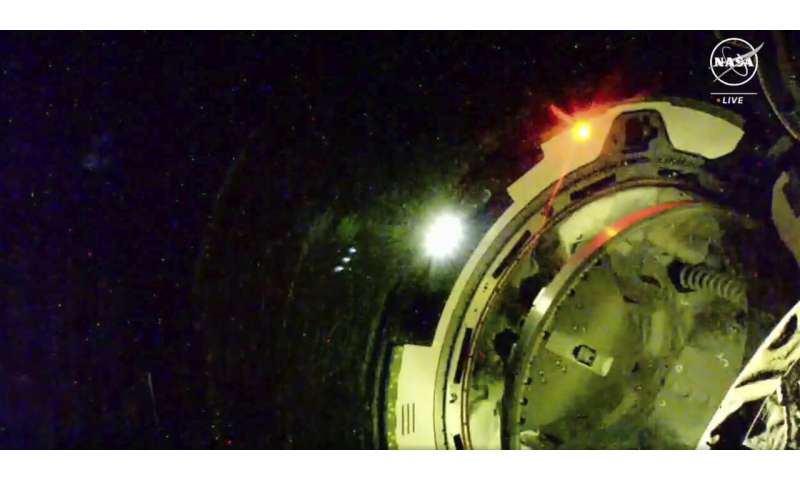 Boeing's astronaut capsule arrives at the space station after thruster trouble