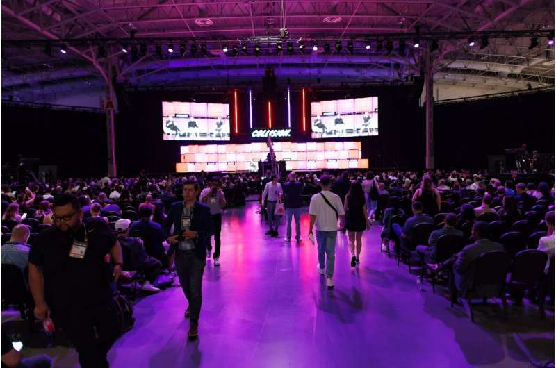 Attendees watch a panel on the main stage during the 2024 Collision tech conference at Enercare Centre in Toronto, Canada, June 18, 2024