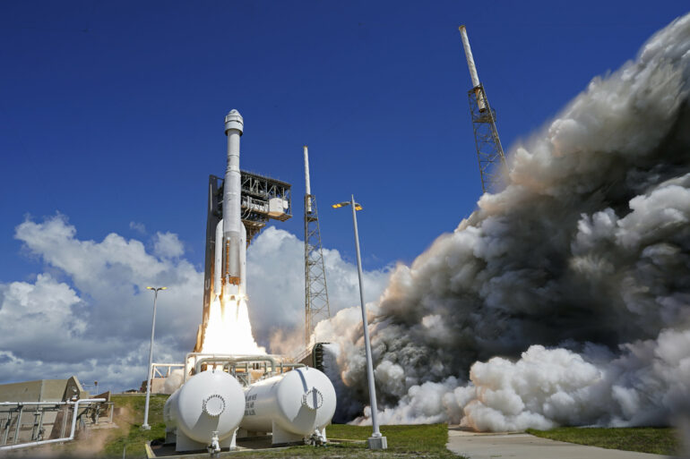 Boeing's astronaut capsule arrives at the space station after ...