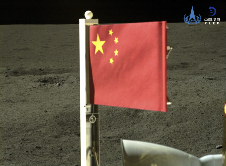 Craft unfurls China's flag on the far side of the moon and lifts ...