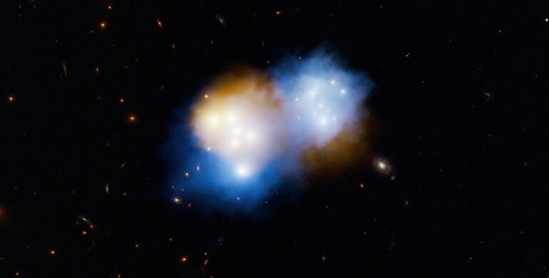 Dark Matter Flies Ahead of Normal Matter in Mega Galaxy Cluster ...