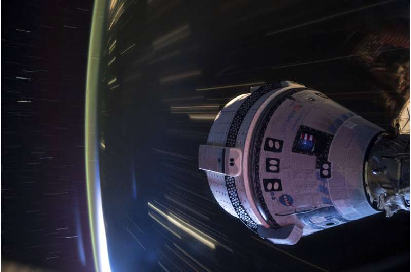 NASA decides to keep 2 astronauts in space until February, nixes return on troubled Boeing capsule