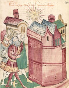 A medieval illustration of a man looking at and pointing at a star bright in the sky over a town.