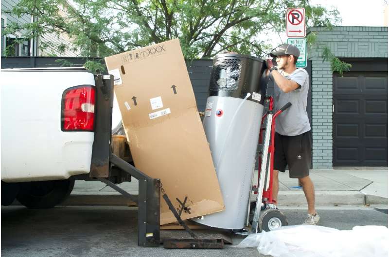 A heat pump hot water heater is unloaded at Su Balasubramanian's house