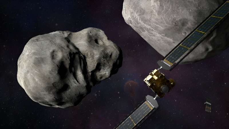 An artist's illustration of the DART spacecraft heading towards the asteroid that it would smash into