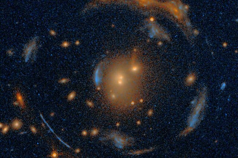 Magnifying deep space through the 'Carousel Lens'—rare alignment ...