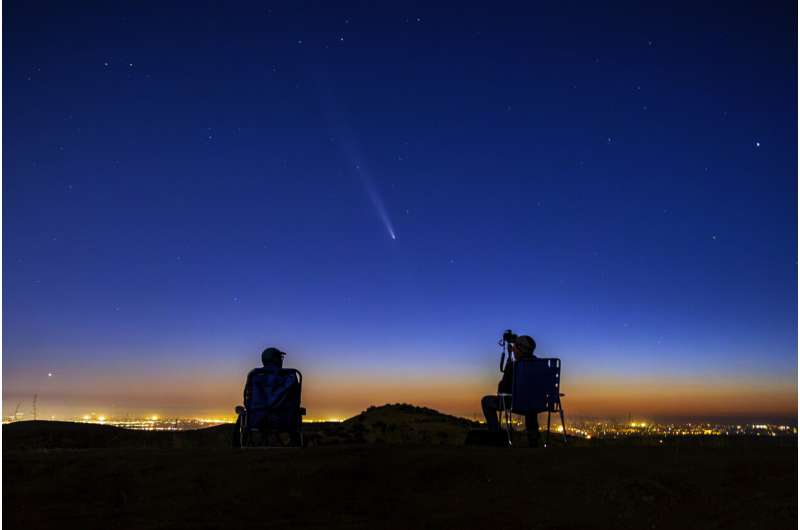 October's supermoon pairs with a comet for a special nighttime spectacle