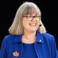 Donna Strickland wearing a blue jacket.