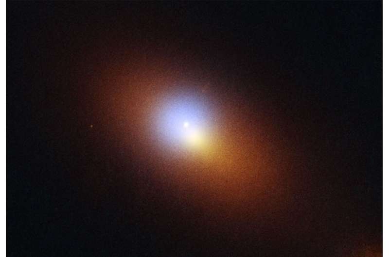 Hubble pinpoints roaming massive black hole