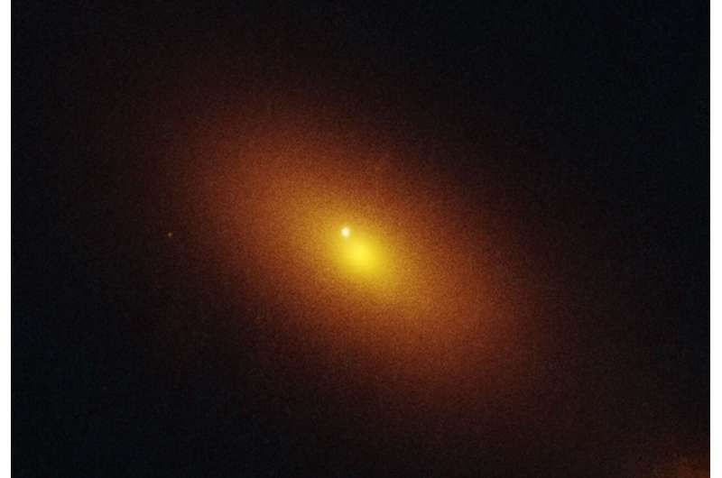 Hubble pinpoints roaming massive black hole
