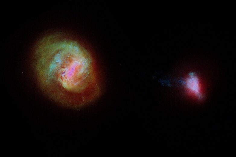 Stretched in a cross pattern: Our neighboring galaxy is pulled in ...