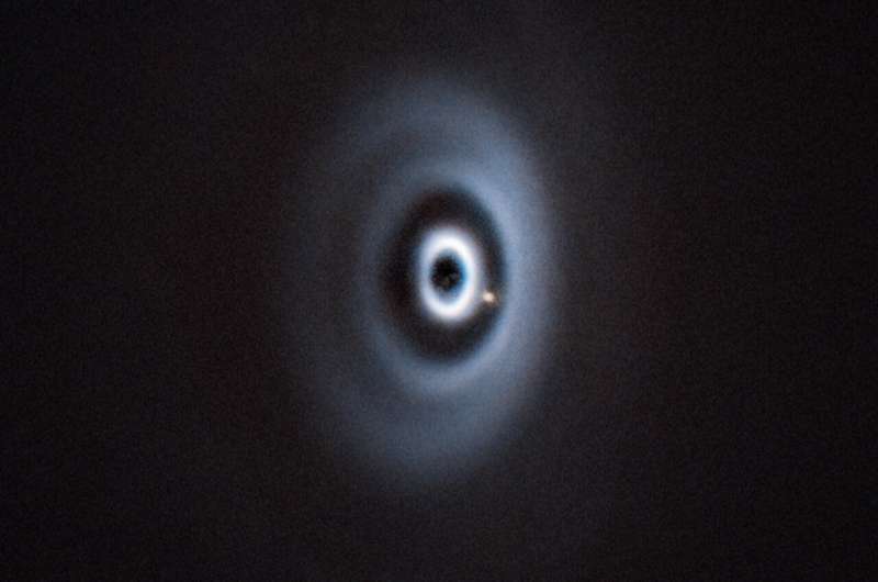 Astronomers make unexpected discovery of planet in formation around a young star