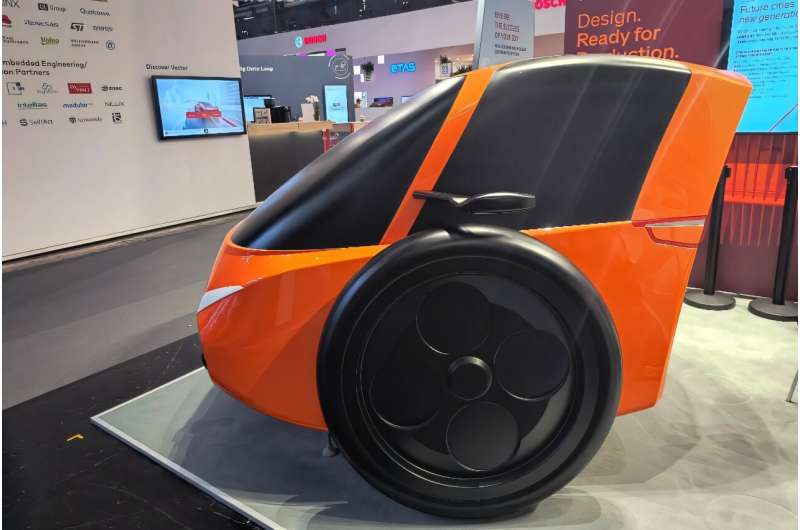 A plastic mock-up of the Wolf etu, a two-wheeled electric concept car