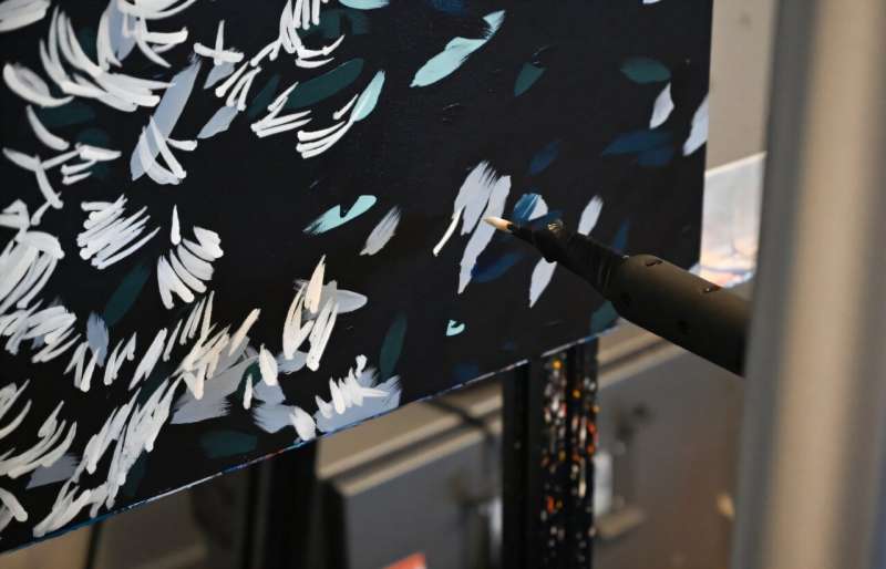 Acrylic Robotics' robots working on a reproduction