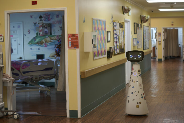A robot programmed to act like a 7-year-old girl works to combat ...