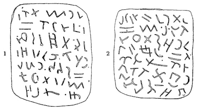sketch of seven lines of alphabet-like notations on two rectangles